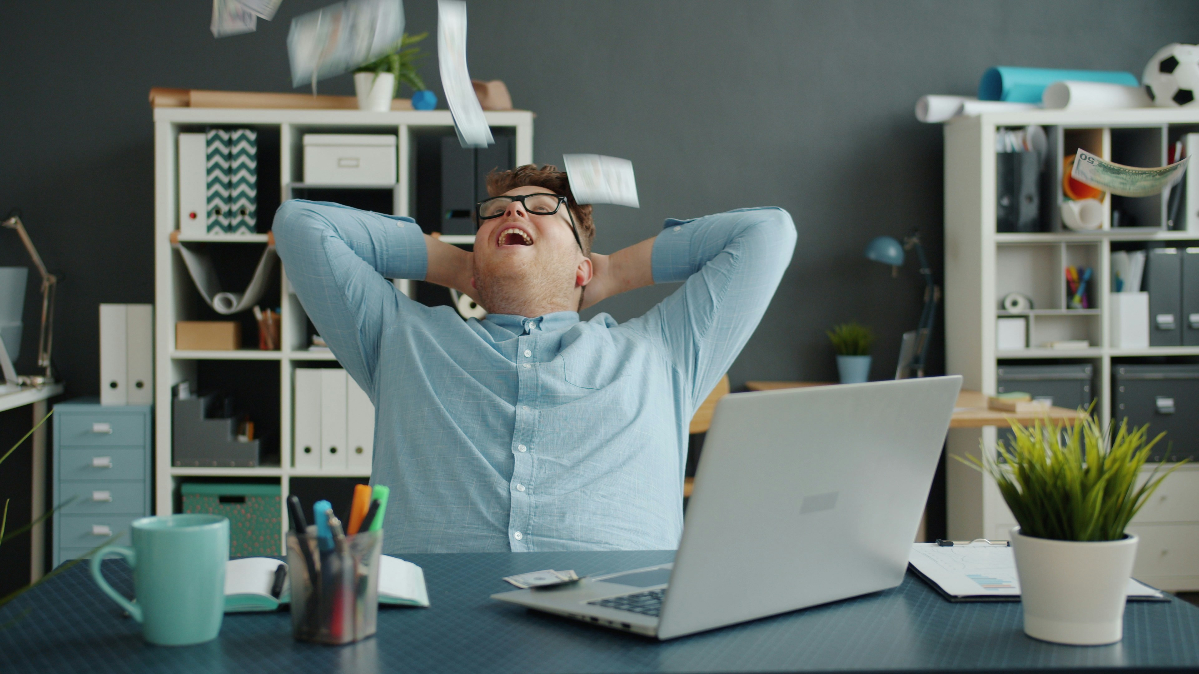 Man relaxing at a desk